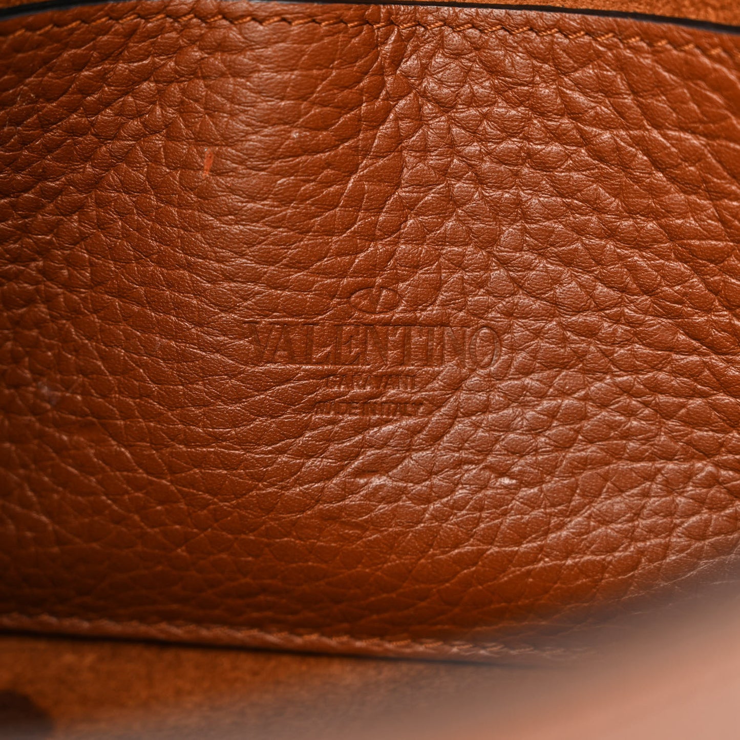Pebbled Calfskin Medium Rockstud Flip Lock Crossbody Bag Bright Cognac