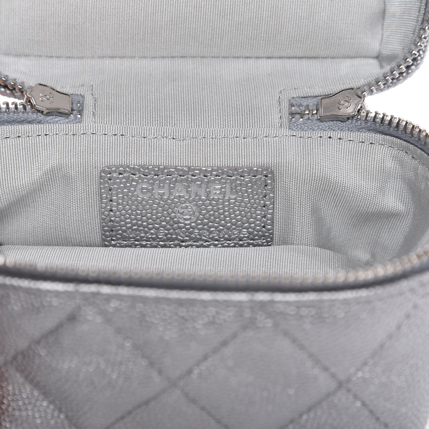 Metallic Caviar Quilted Mini Top Handle Vanity With Chain Silver