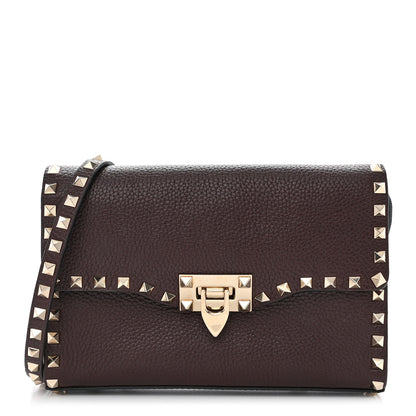 Valentino Garavani Pebbled Calfskin Medium Rockstud Flip Lock Crossbody Bag Rubin 1 of 10