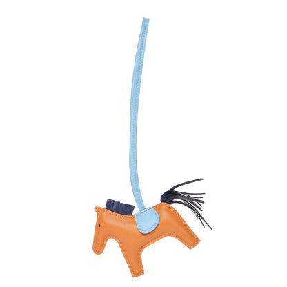 Hermes Milo Lambskin Grigri Rodeo Horse Bag Charm PM Naturel Bouton D'Or Celeste Bleu Saphir 1 of 4