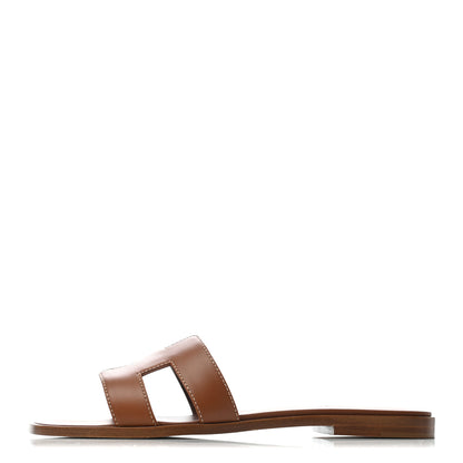 Hermes Box Calfskin Oran Sandals 37.5 Gold 1 of 6