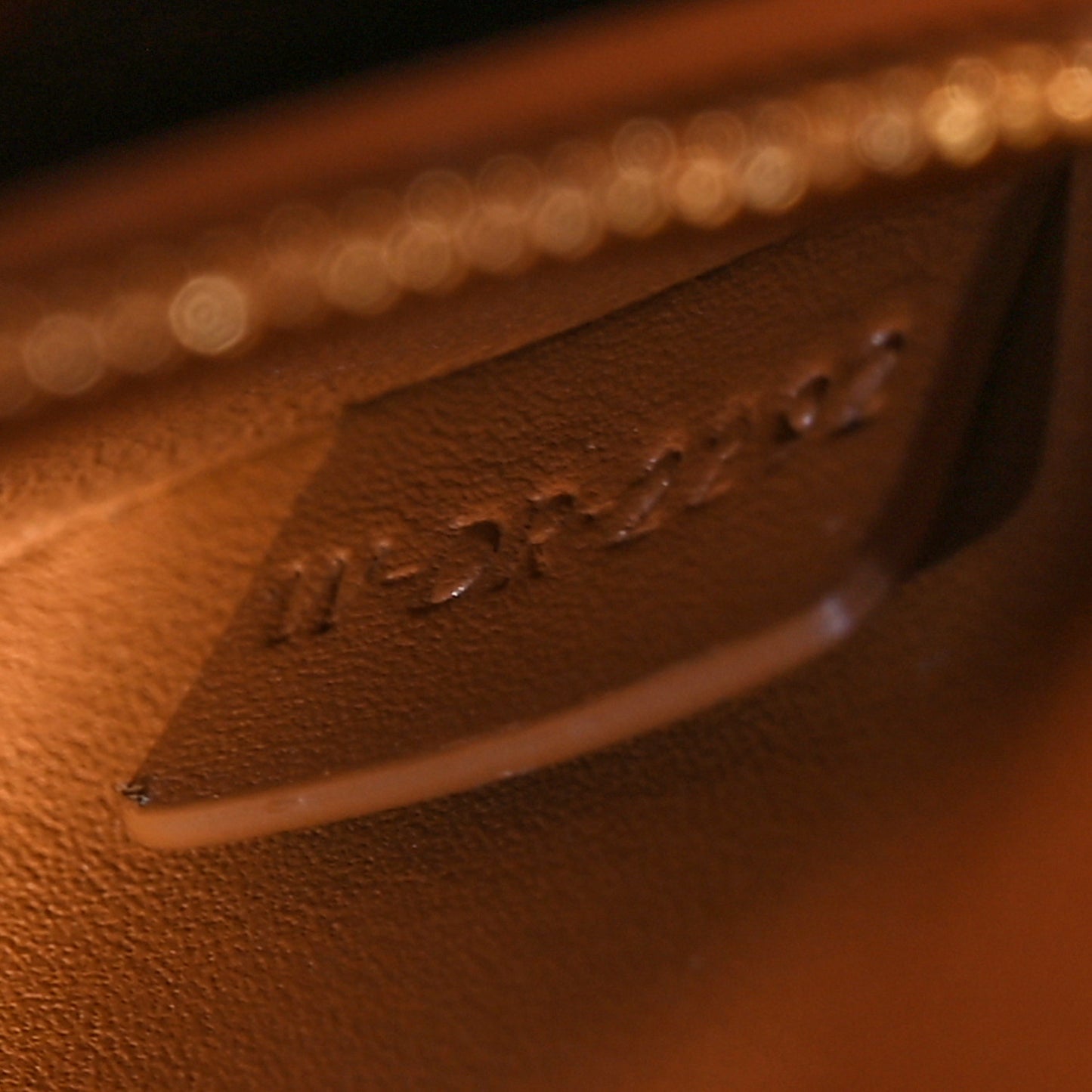 Triomphe Canvas Asymmetric Clutch Tan