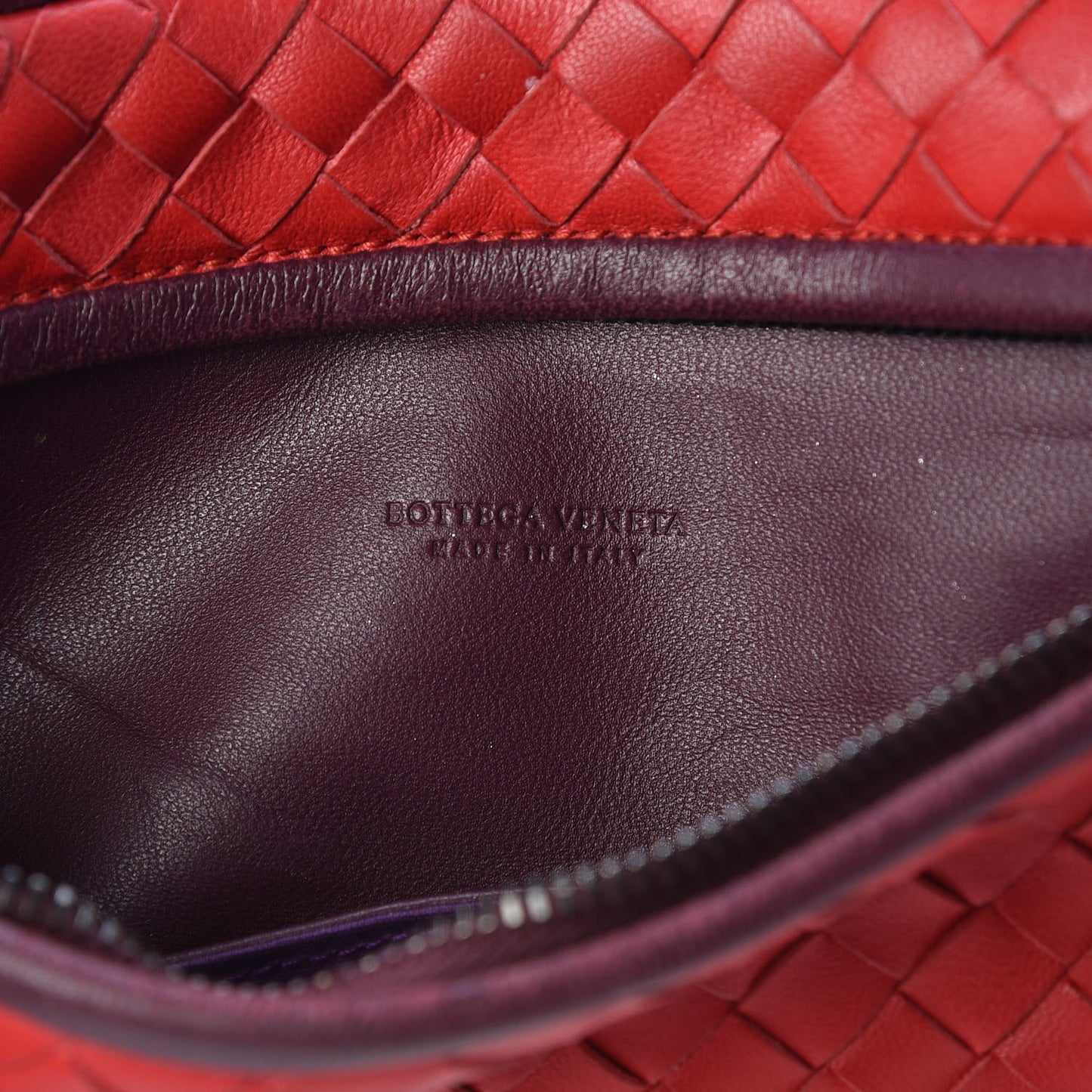 Nappa Intrecciato Zip Clutch Fraise Aubergine