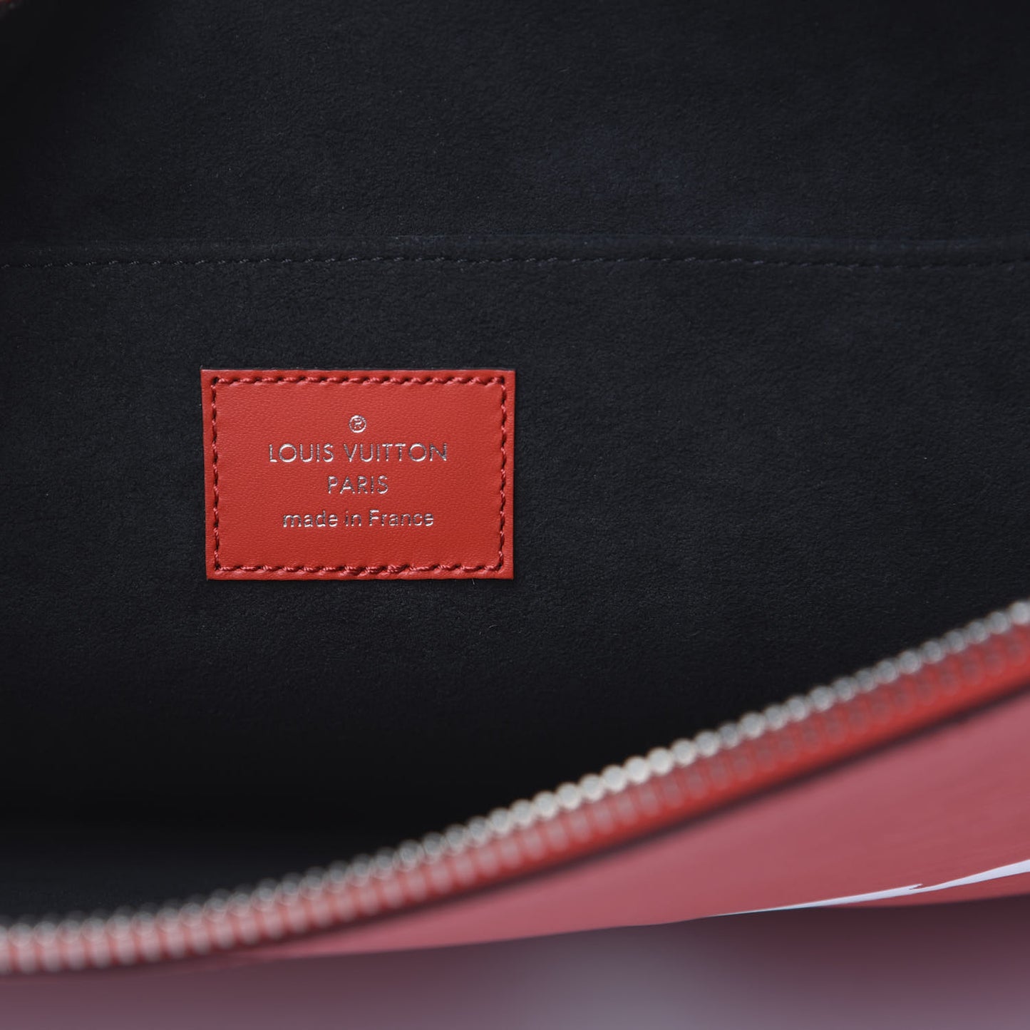 X SUPREME Epi Pochette Jour GM Red