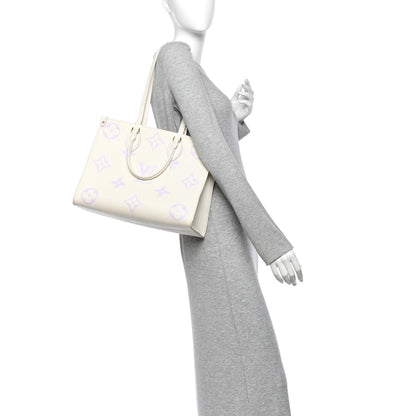 Louis Vuitton Empreinte Monogram Giant Onthego MM Latte Bubble Tea 2 of 11