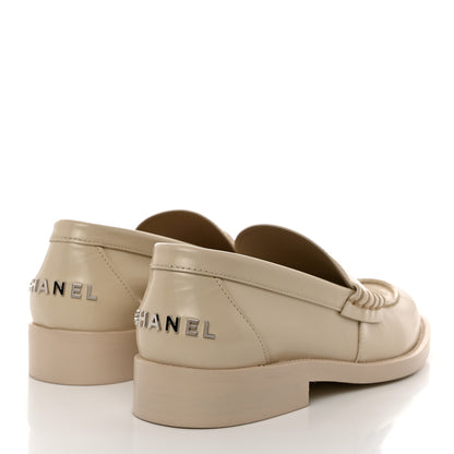 Chanel Shiny Calfskin Logo Loafers 37.5 Beige 4 of 10