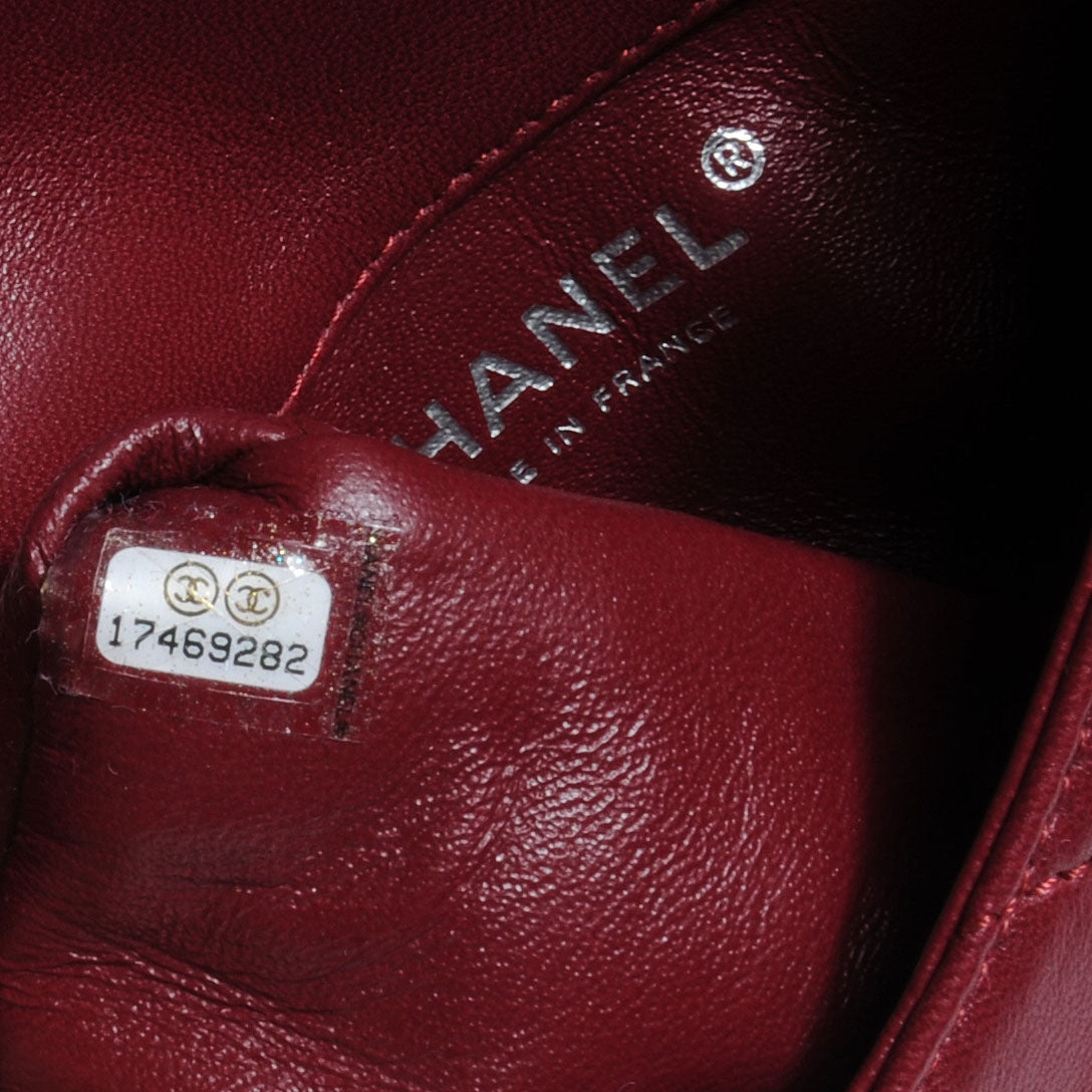 Lambskin Mineral Nights Flap Wristlet Dark Red