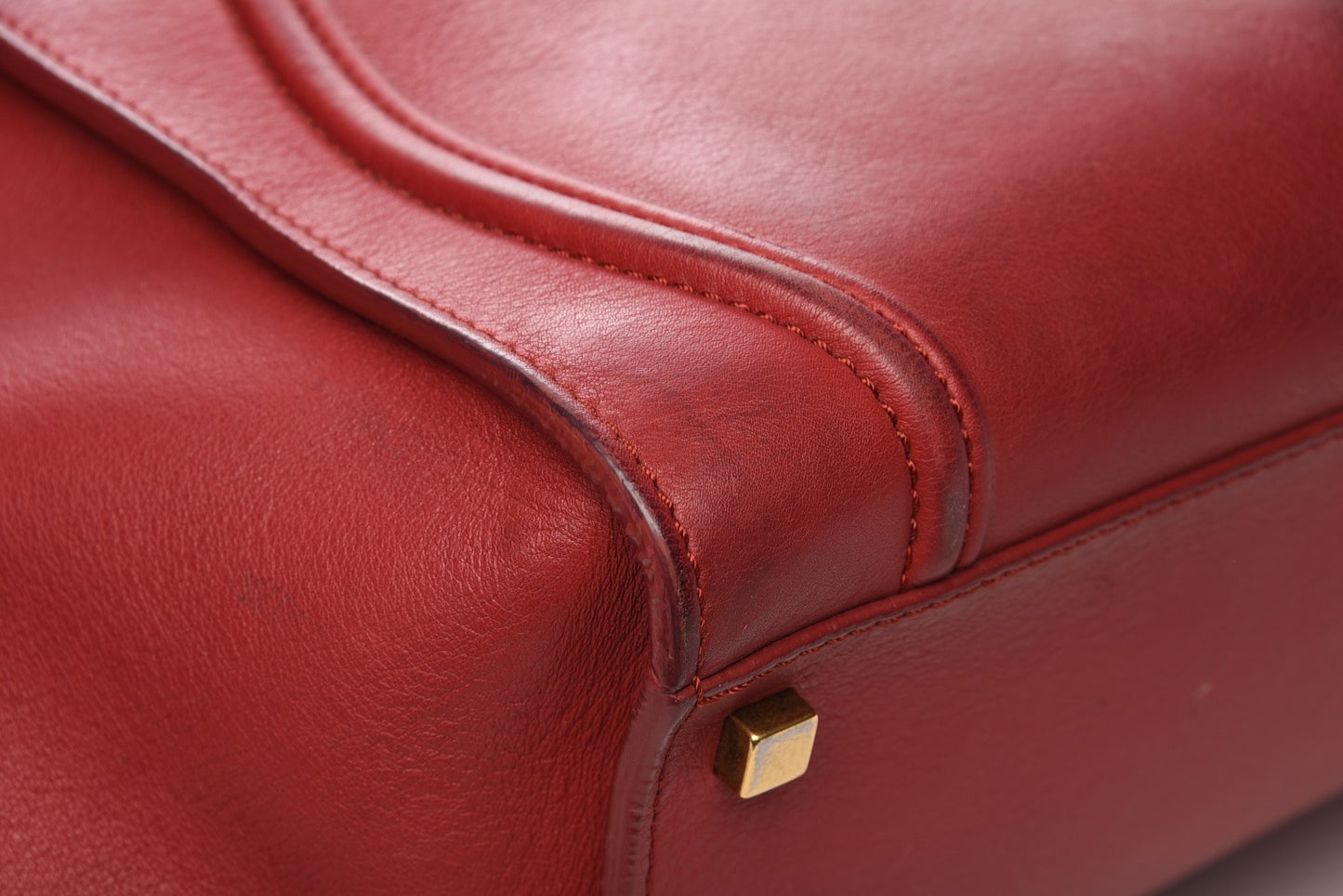 Supple Calfskin Medium Phantom Luggage Red