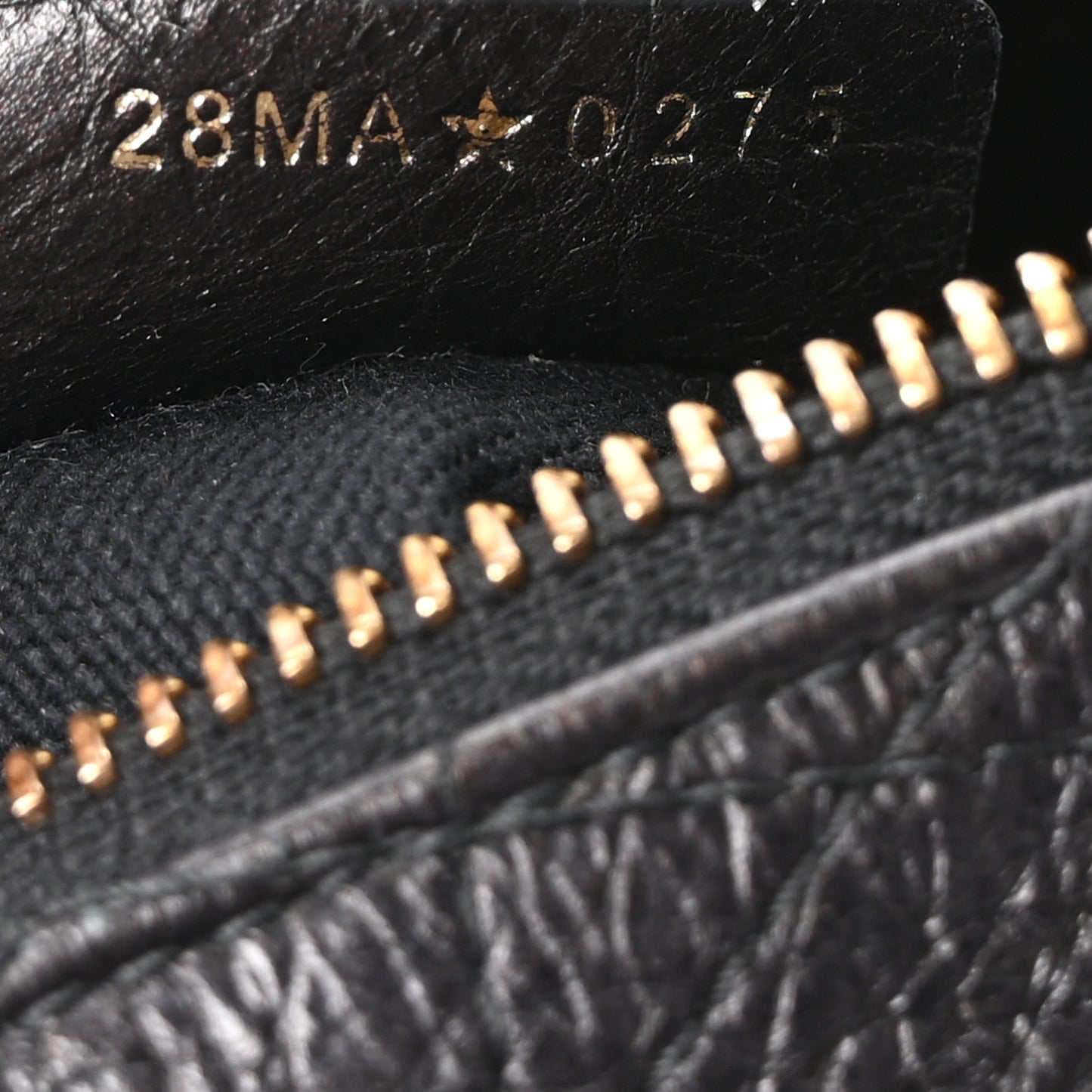 Grained Calfskin Flat Macrocannage Medium Voyage Bag Black