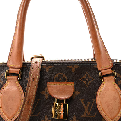 Louis Vuitton Monogram Rivoli MM 7 of 10