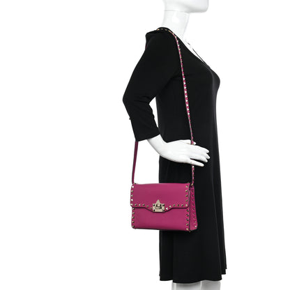 Valentino Garavani Pebbled Calfskin Medium Rockstud Flip Lock Crossbody Bag Rose Violet 2 of 9