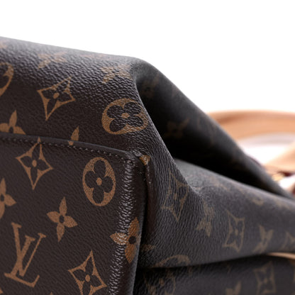Louis Vuitton Monogram Rivoli MM 9 of 13