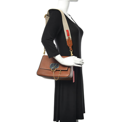 Valentino Garavani Pebbled Calfskin Small VRing Shoulder Bag Saddle Brown 2 of 9