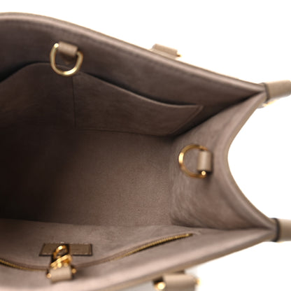 Louis Vuitton Empreinte Monogram Giant Onthego PM Tourterelle Creme 5 of 9