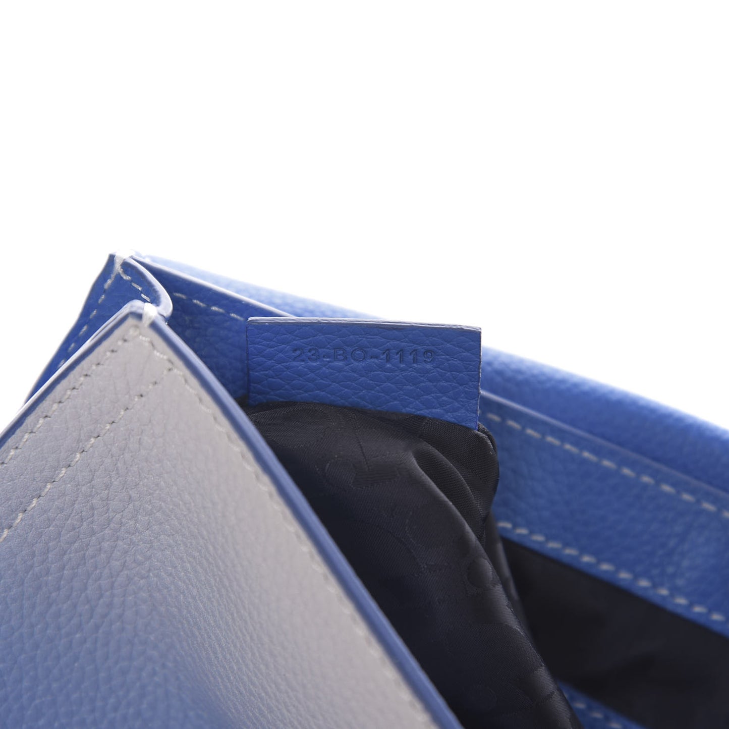 X KAWS Grained Calfskin Saddle Pouch