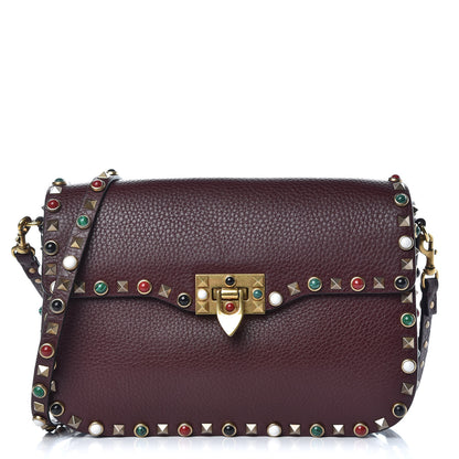 Valentino Garavani Pebbled Calfskin Medium Rockstud Rolling Flap Saddle Bag Rubin 1 of 9