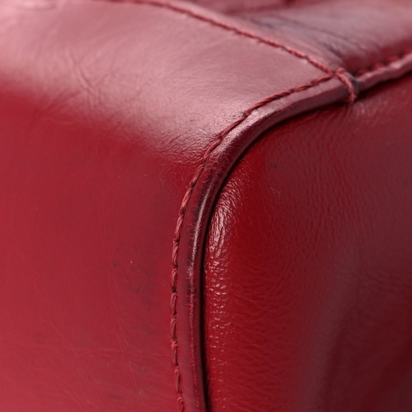 Aged Calfskin Chevron Quilted Backpack Red