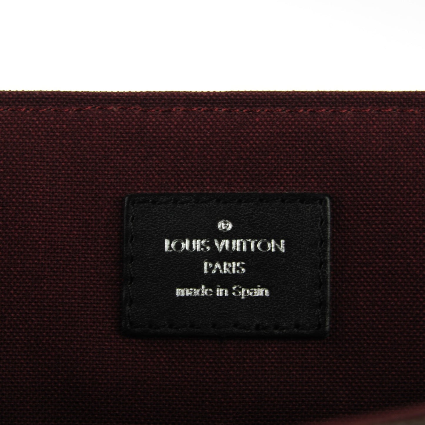 Monogram Macassar District MM