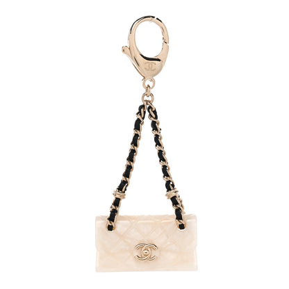Chanel Metal Resin Calfskin CC Quilted Flap Bag Charm Gold White 1 of 4