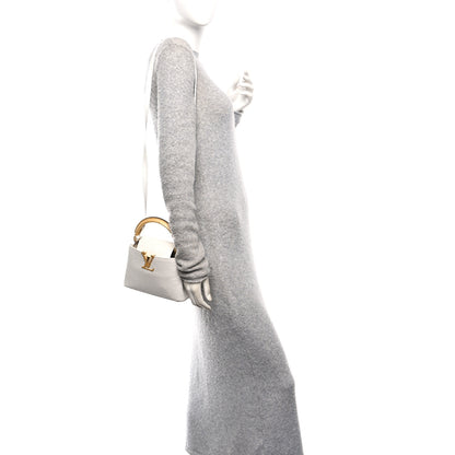 Louis Vuitton Iridescent Ostrich Capucines Mini White Gold 2 of 9