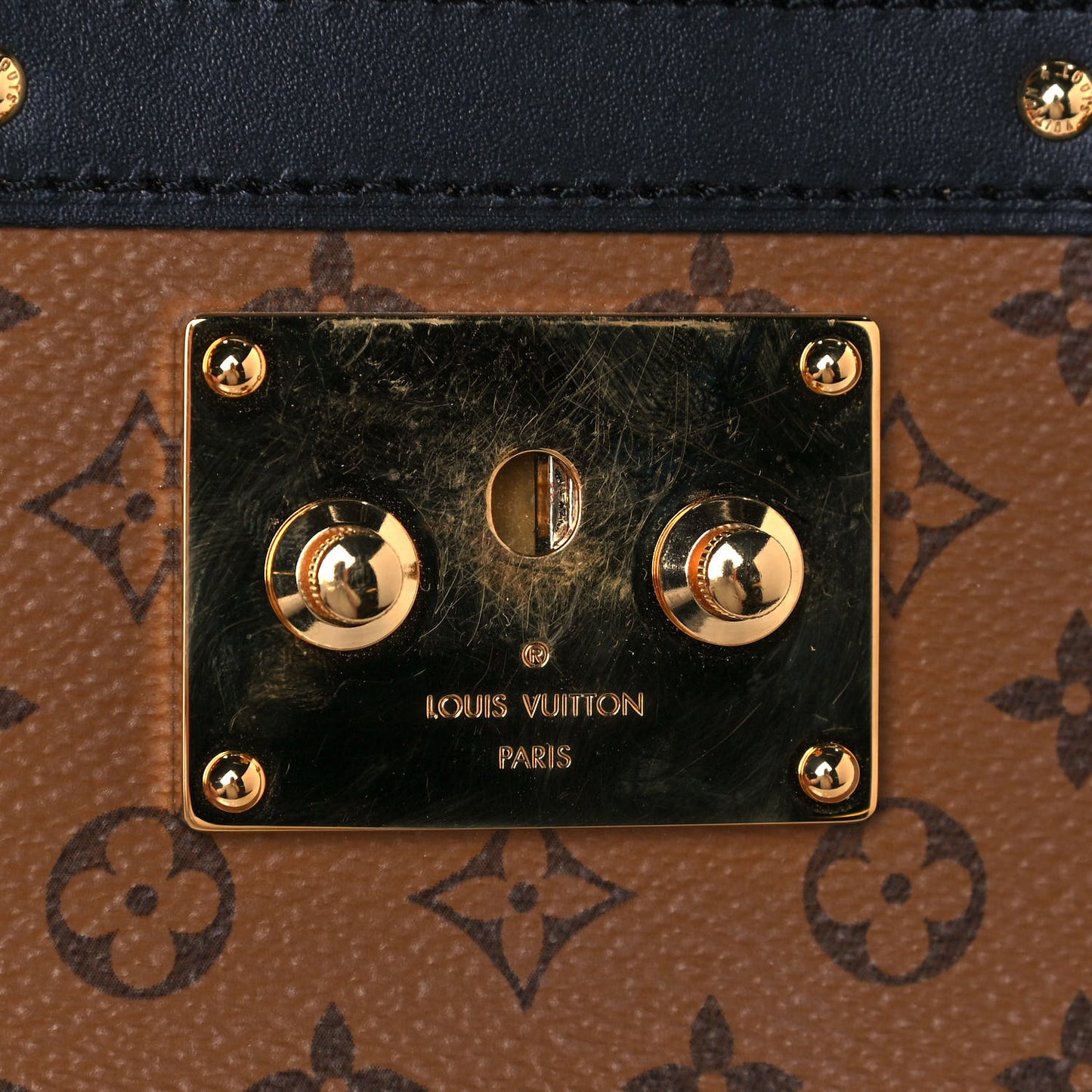 Reverse Monogram Trunk Clutch