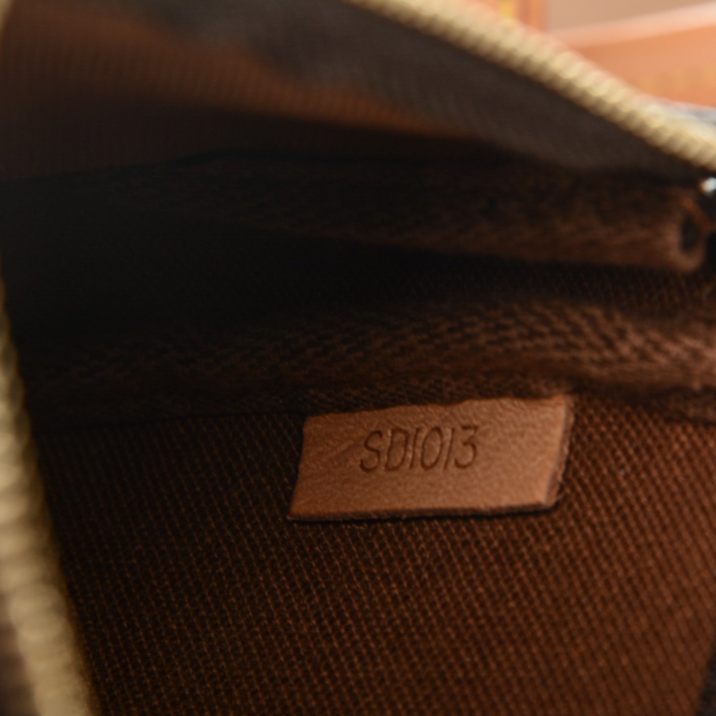 Monogram Petit Bucket 23