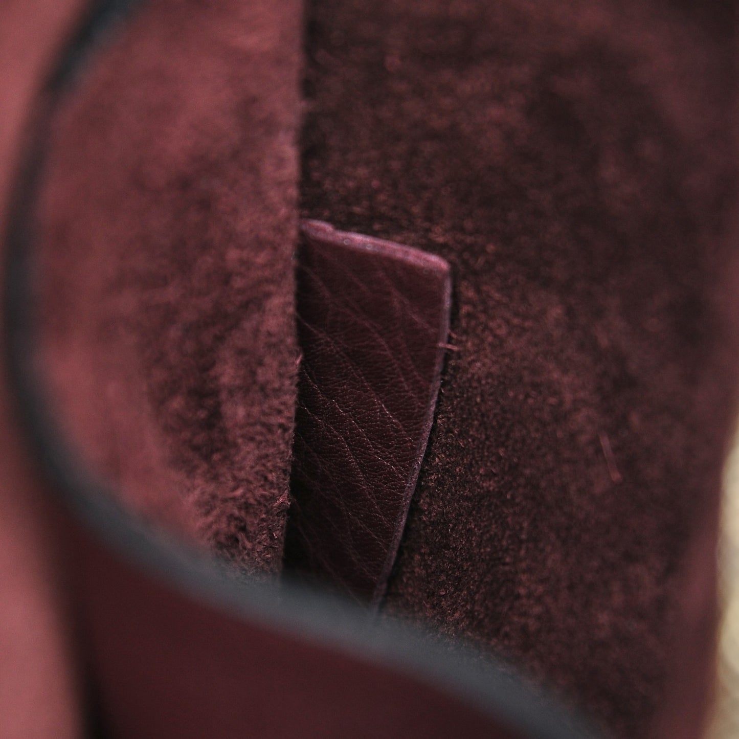 Pebbled Calfskin Rockstud Triple Zip Wristlet Pouch Burgundy