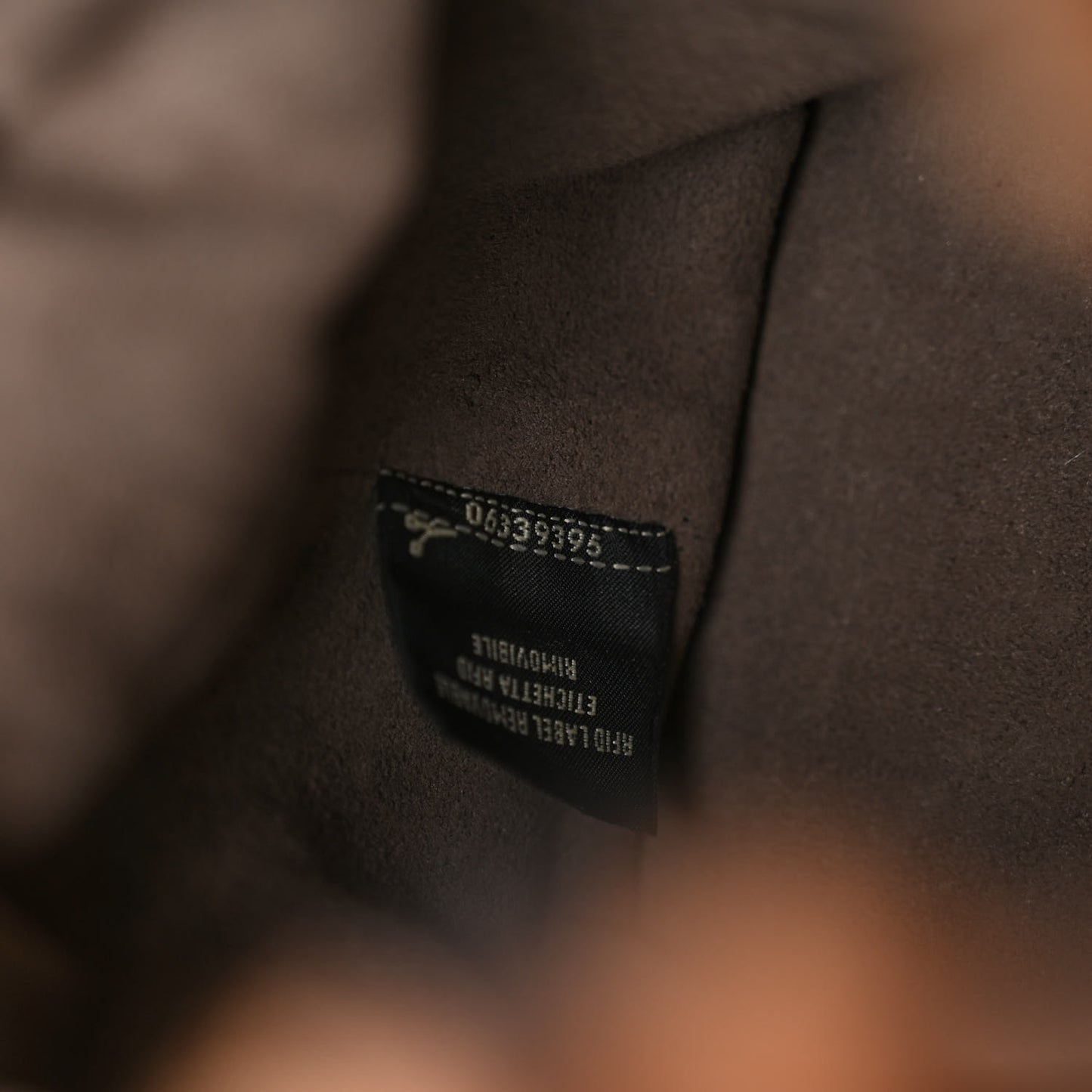 Shearling Vitello Dolce F is Fendi Macro FF 1974 Mini Mon Tresor Bucket Bag Tobacco Black