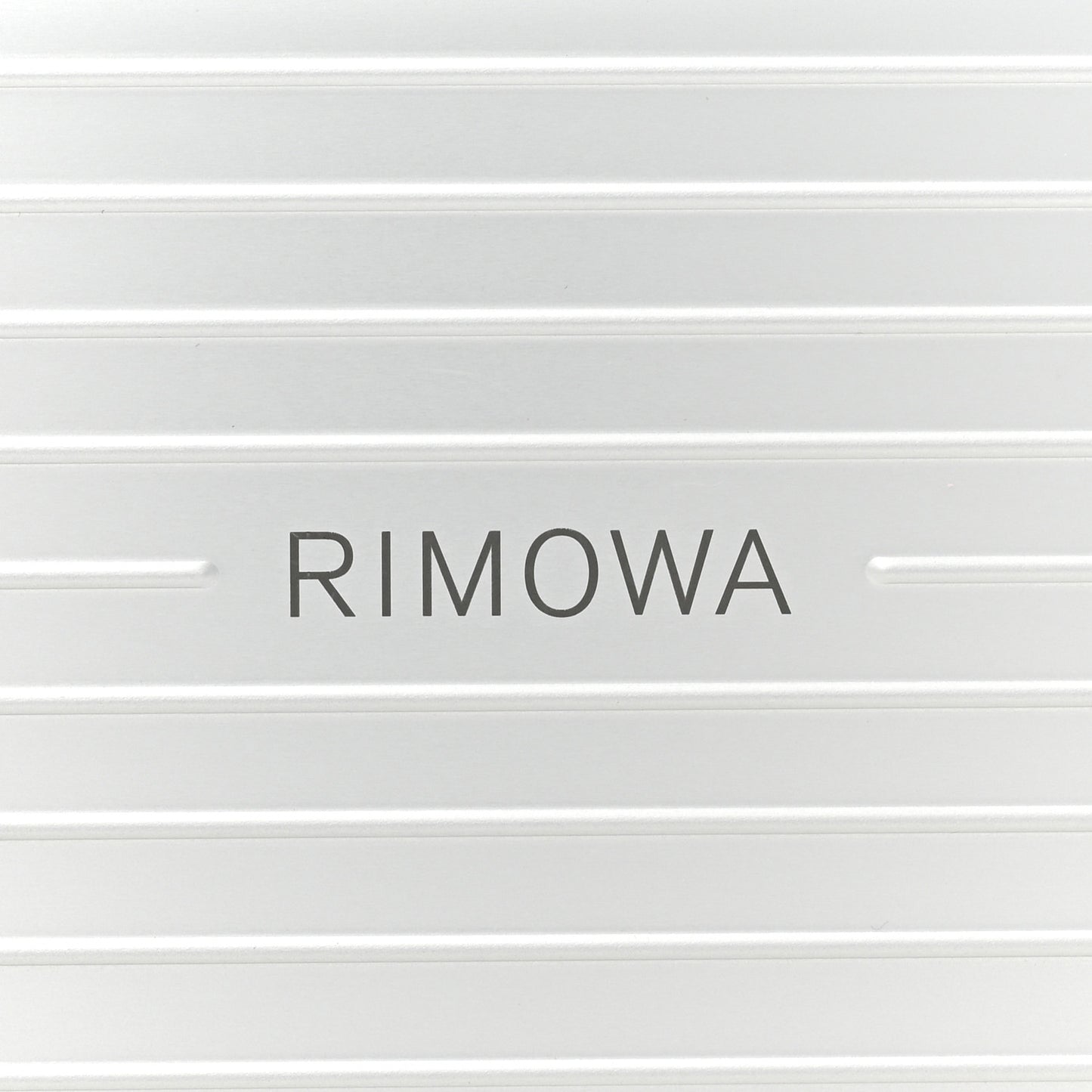 X RIMOWA Aluminum Personal Clutch On Strap Silver
