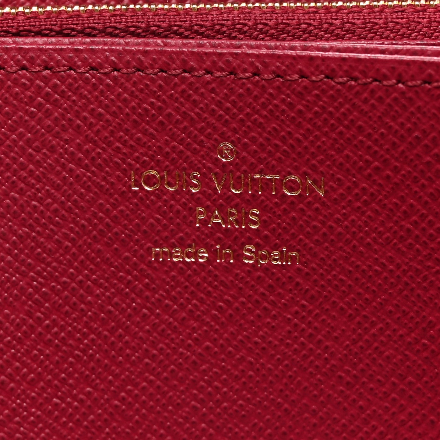 Monogram Pompon Zippy Wallet Fuchsia