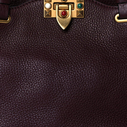 Valentino Garavani Grained Calfskin Small Rockstud Rolling Tote Rubin 7 of 9