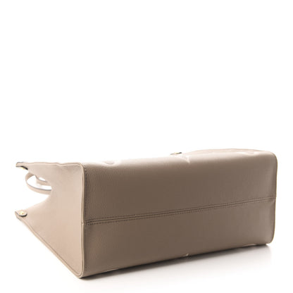 Louis Vuitton Empreinte Monogram Giant Onthego MM Tourterelle Creme 4 of 10