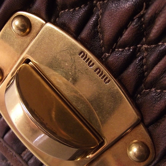 Leather Matelasse Turn Lock Flap