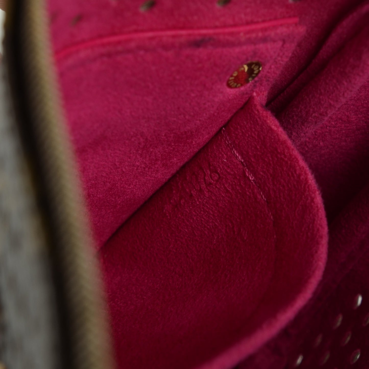 Monogram Perforated Pochette Accessories Bag Fuchsia