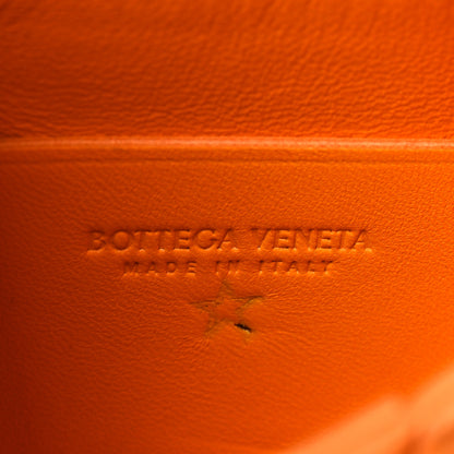 Bottega Veneta Lambskin Maxi Intrecciato Extra Mini Cassette Crossbody Bag Tangerine 6 of 9