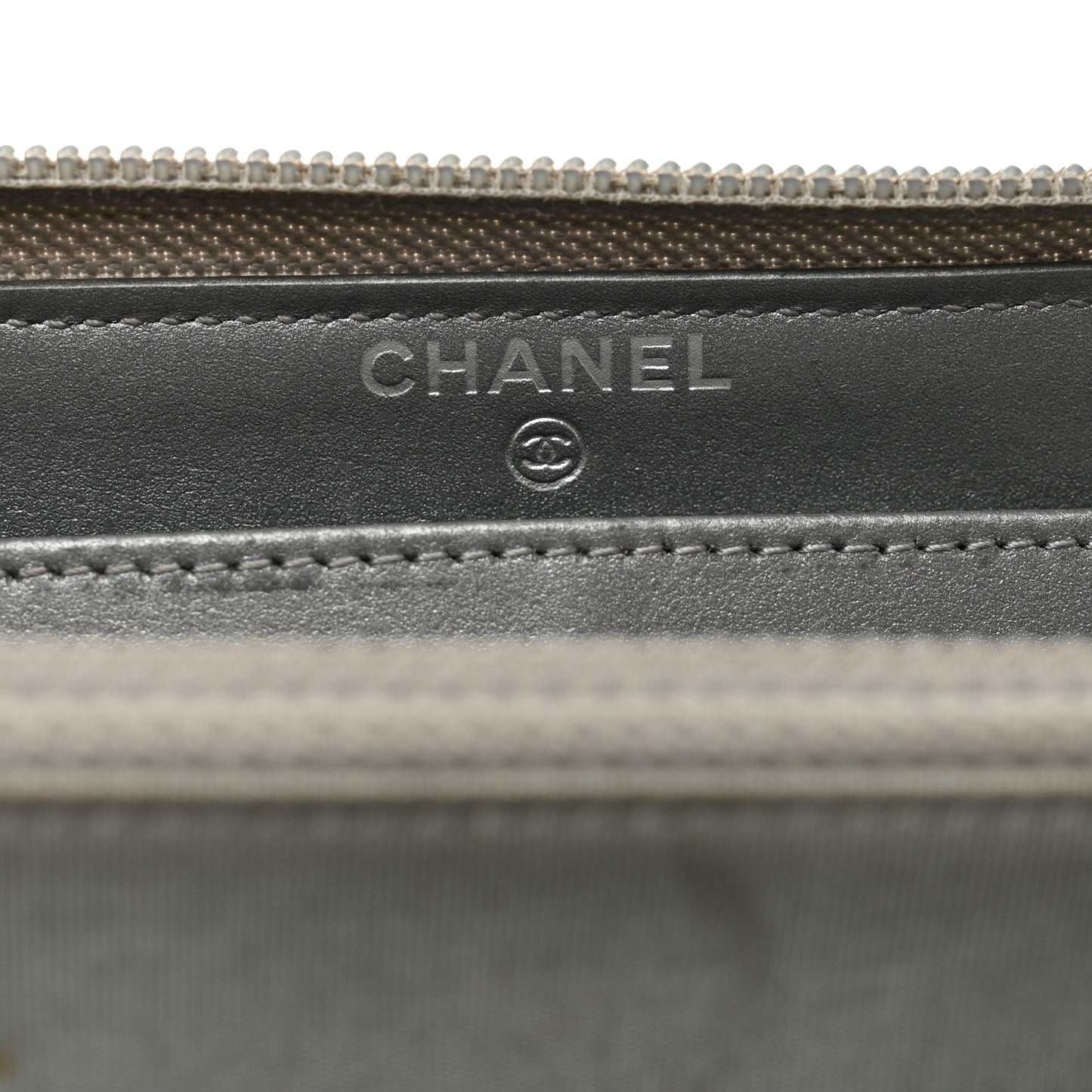 Metallic Caviar Quilted Boy Zip Around Wallet Silver