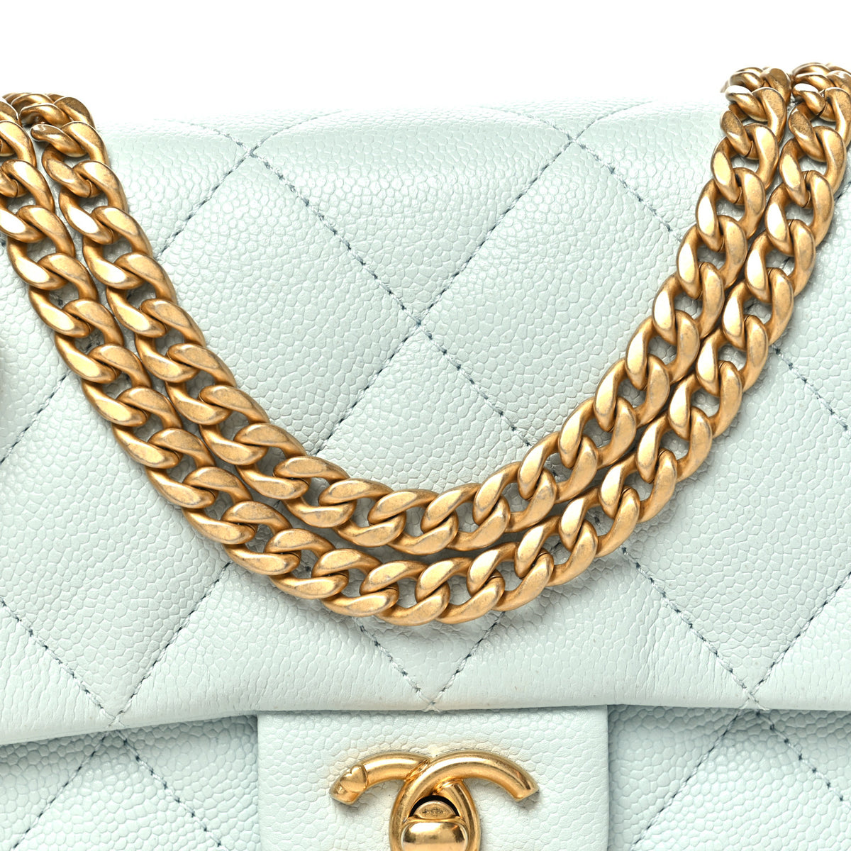 Caviar Quilted Mini Sweetheart Flap Light Blue