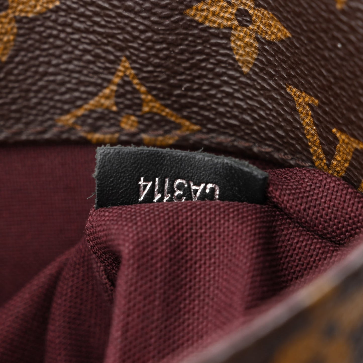Monogram Macassar District PM