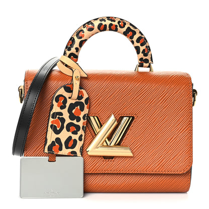 Louis Vuitton Epi Wild At Heart Twist One Handle MM Gold Cipango 1 of 9
