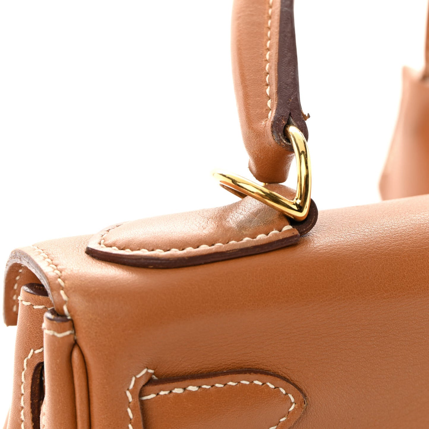 Swift Kelly Retourne 28 Gold