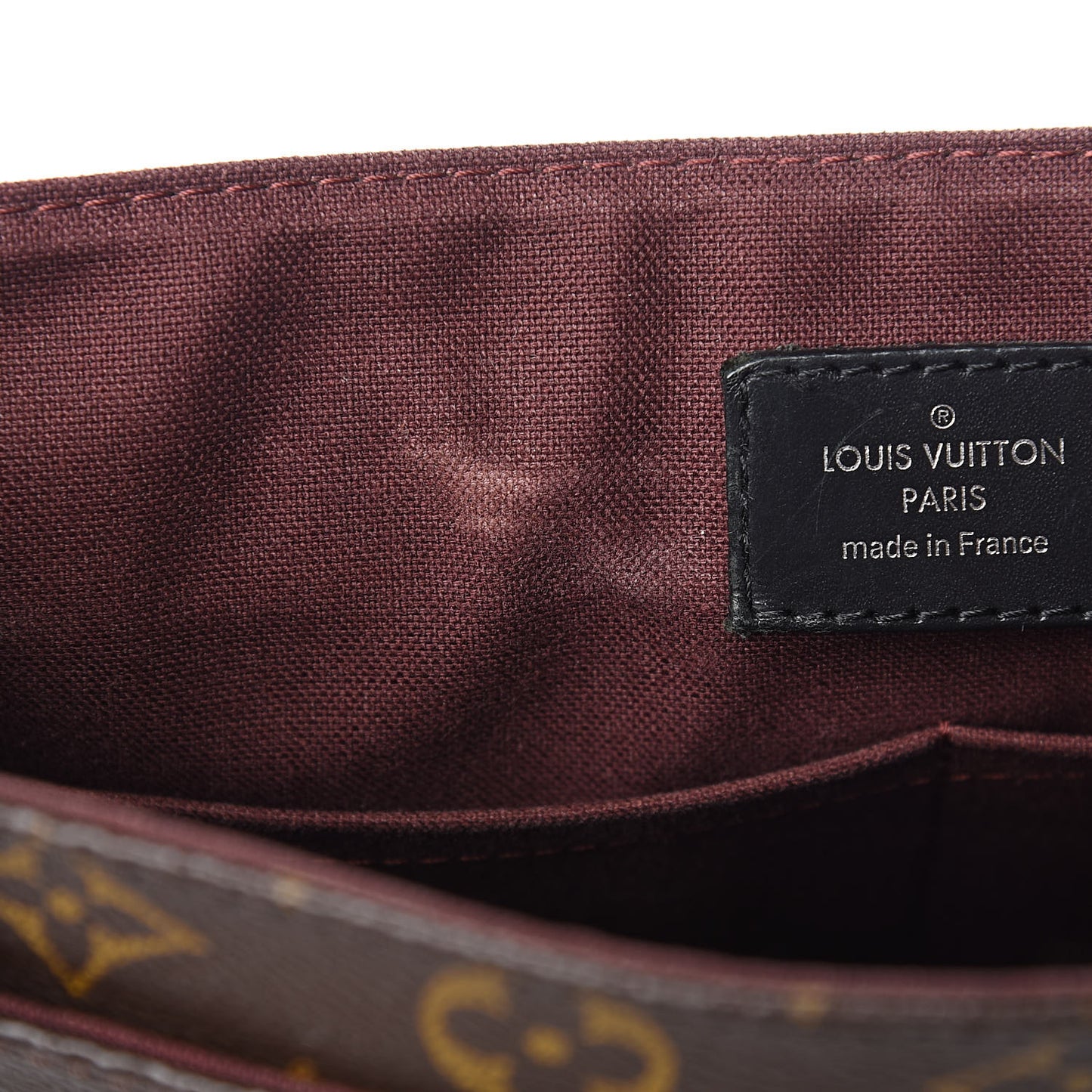 Monogram Macassar District PM