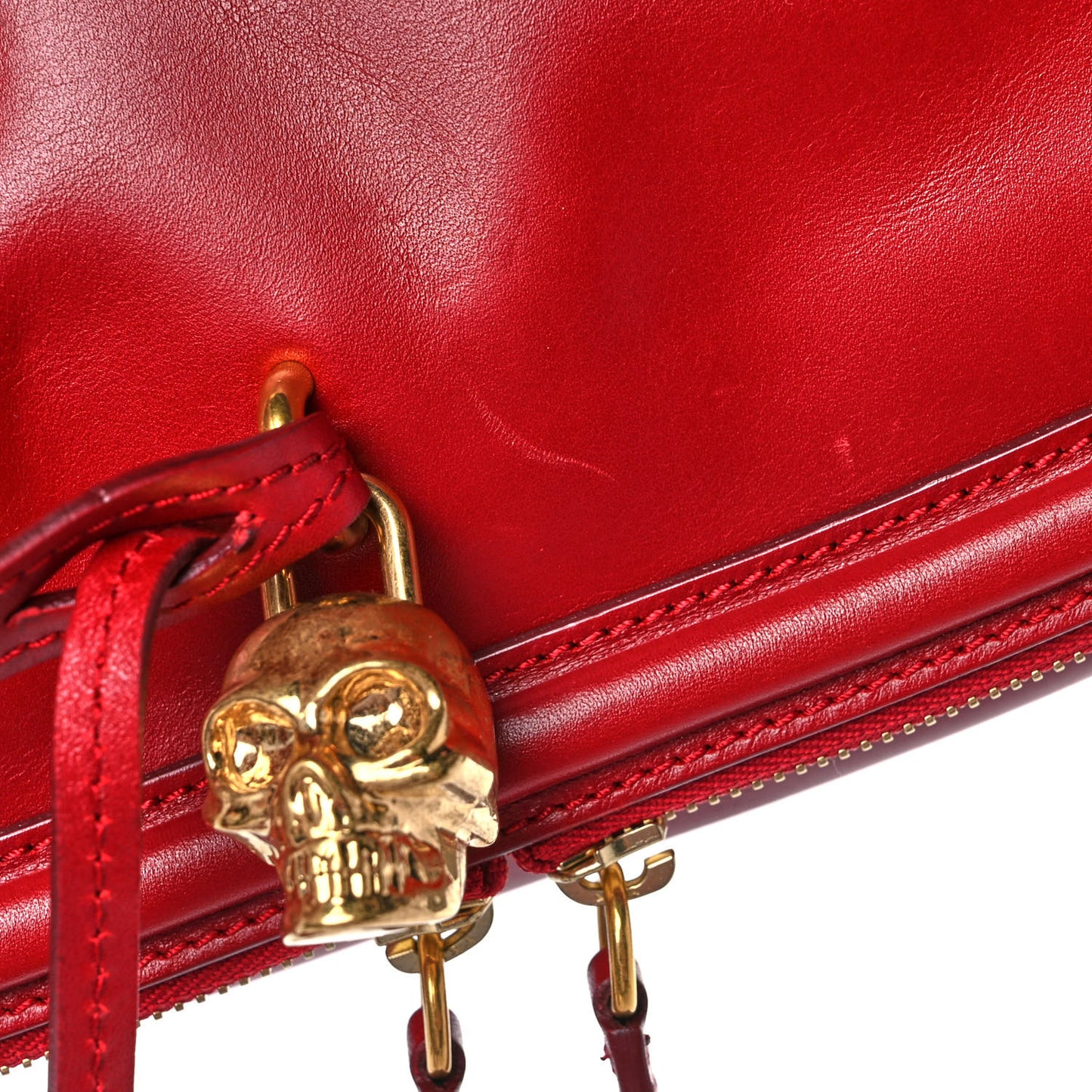 Grainy Calfskin Padlock Skull Clutch Red