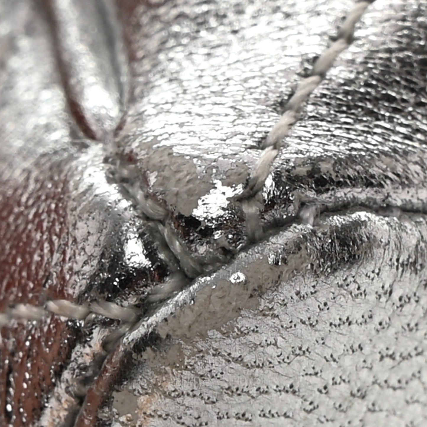 Metallic Lambskin Quilted Micro Drawstring Pouch Silver