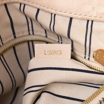 Louis Vuitton Empreinte Artsy MM Neige 7 of 32