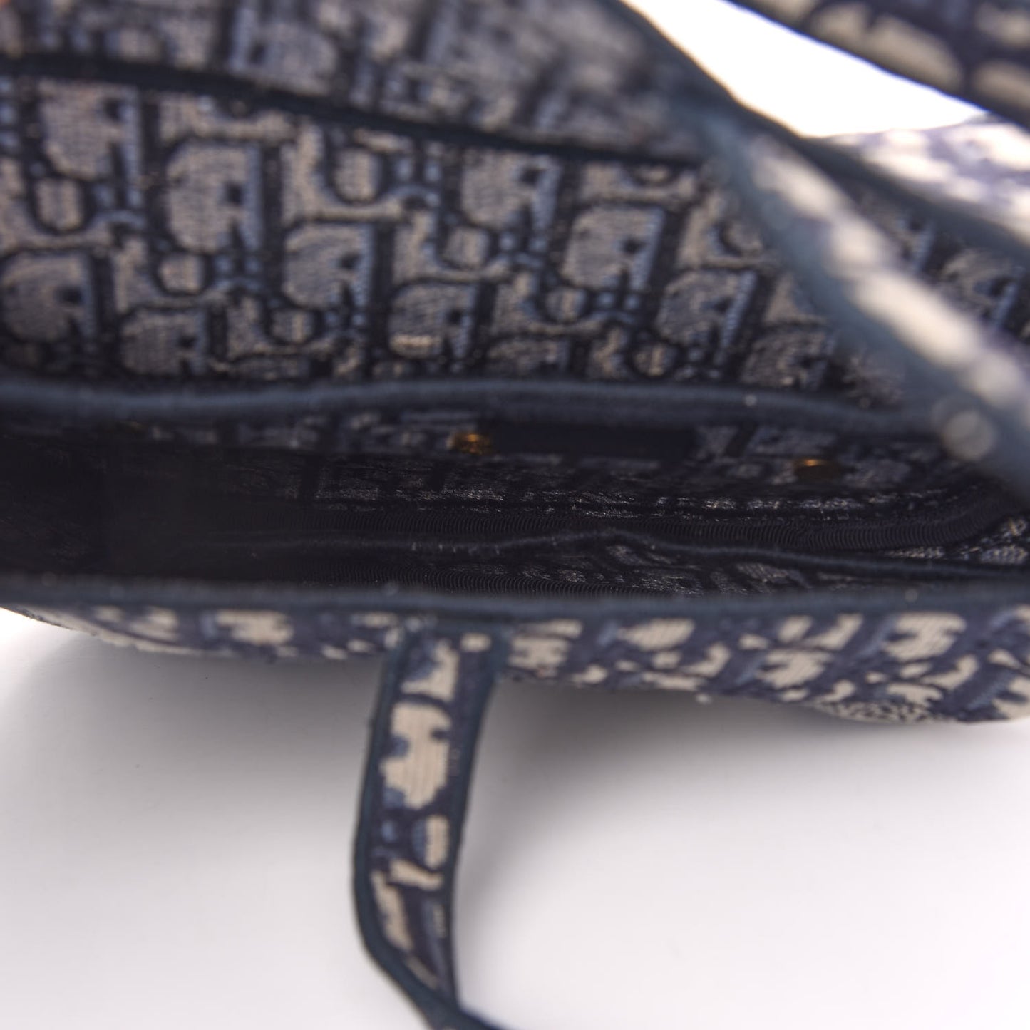 Oblique Embroidered Saddle Bag Blue