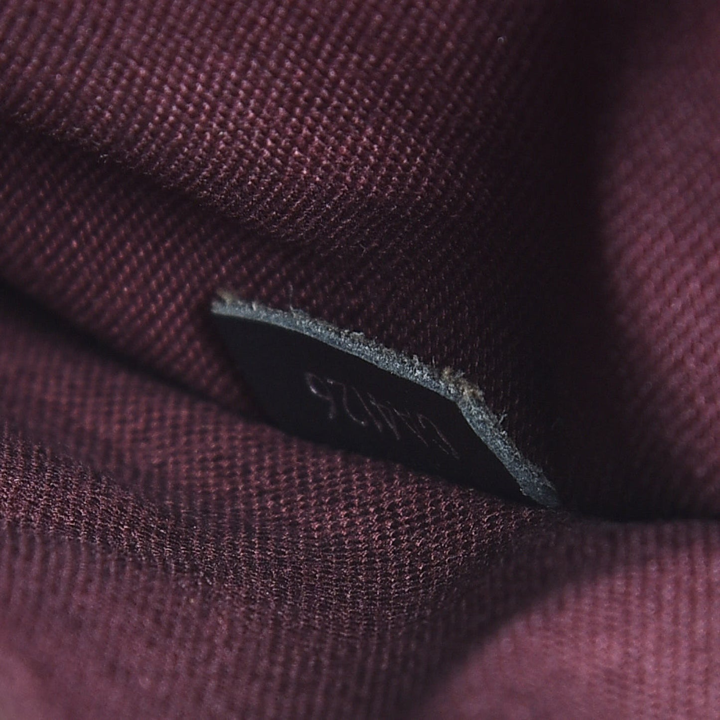 Monogram Macassar District PM