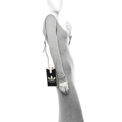 Gucci X ADIDAS Textured Dollar Calfskin Trefoil Embossed Phone Crossbody Bag Black Off White 2 of 12