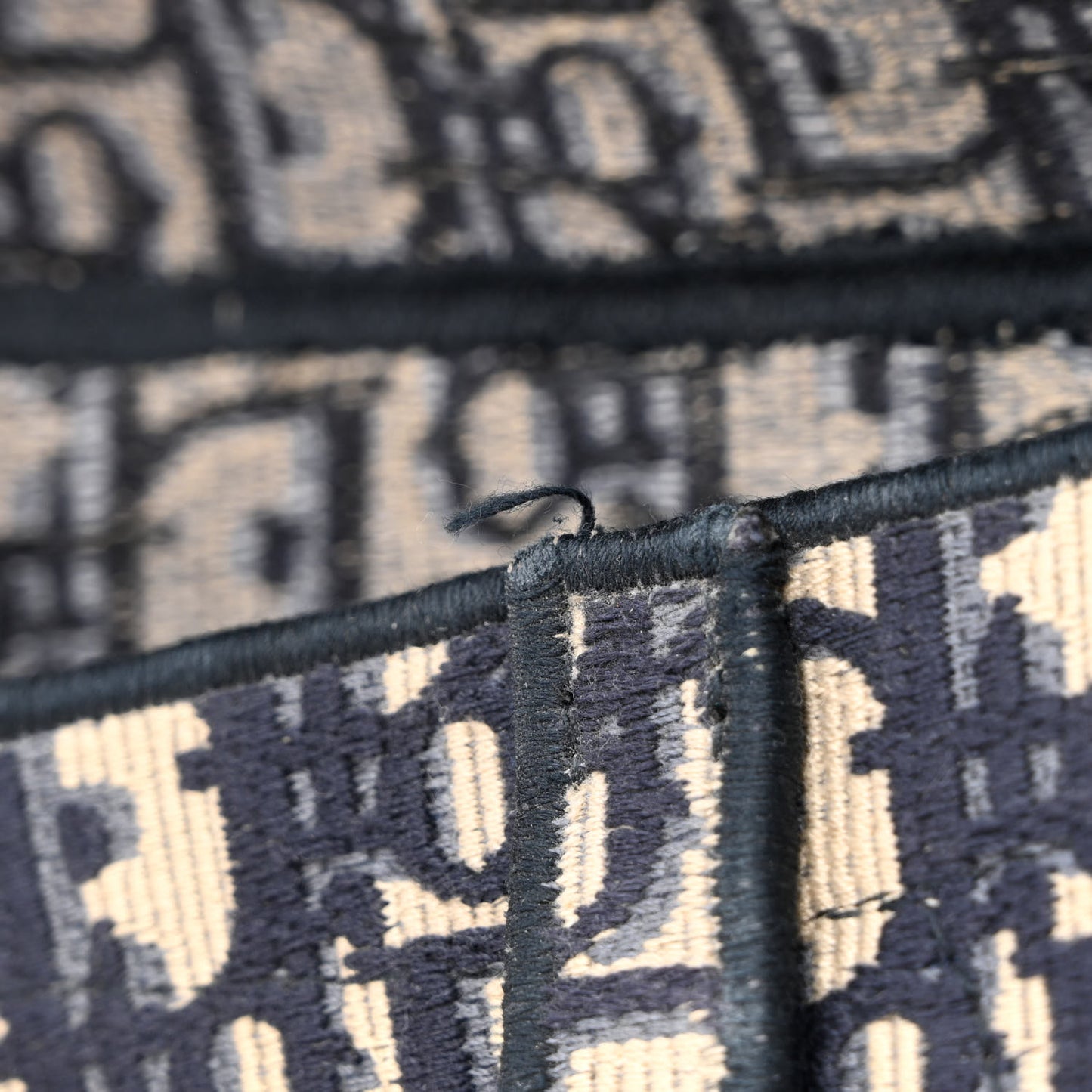 Oblique Embroidered Saddle Bag Blue