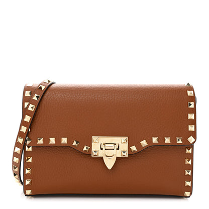 Valentino Garavani Pebbled Calfskin Medium Rockstud Flip Lock Crossbody Bag Saddle Brown 1 of 9