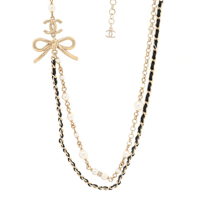 Chanel Calfskin Pearl Metal CC Bow Necklace Gold White Black 1 of 3